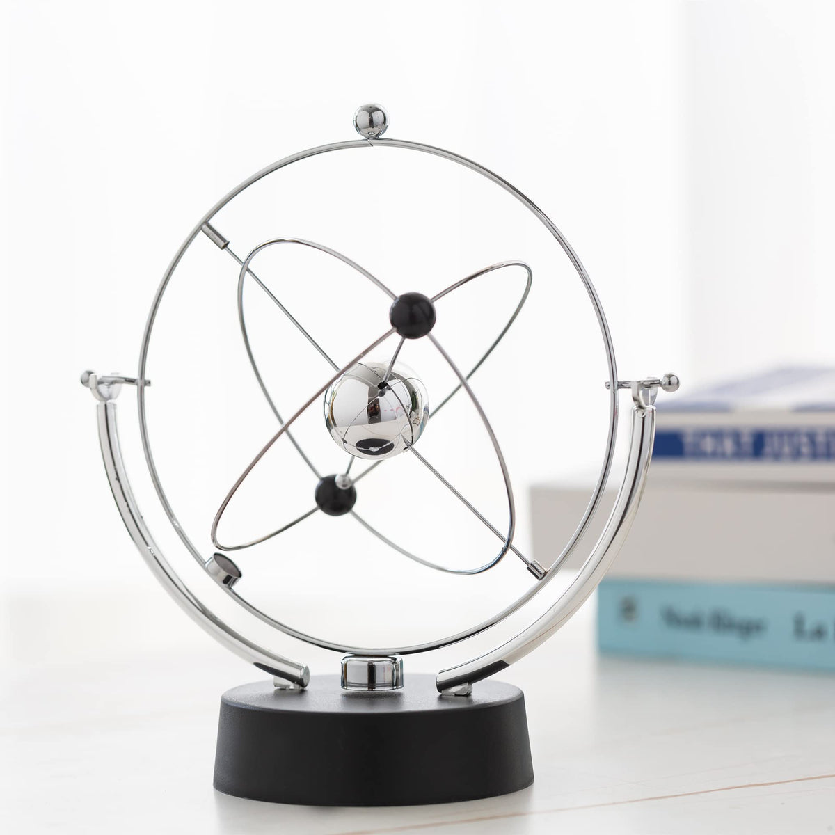CHANGSHUN Electronic Perpetual Motion Battery Operated Home Office Desk Ornament (Universe)