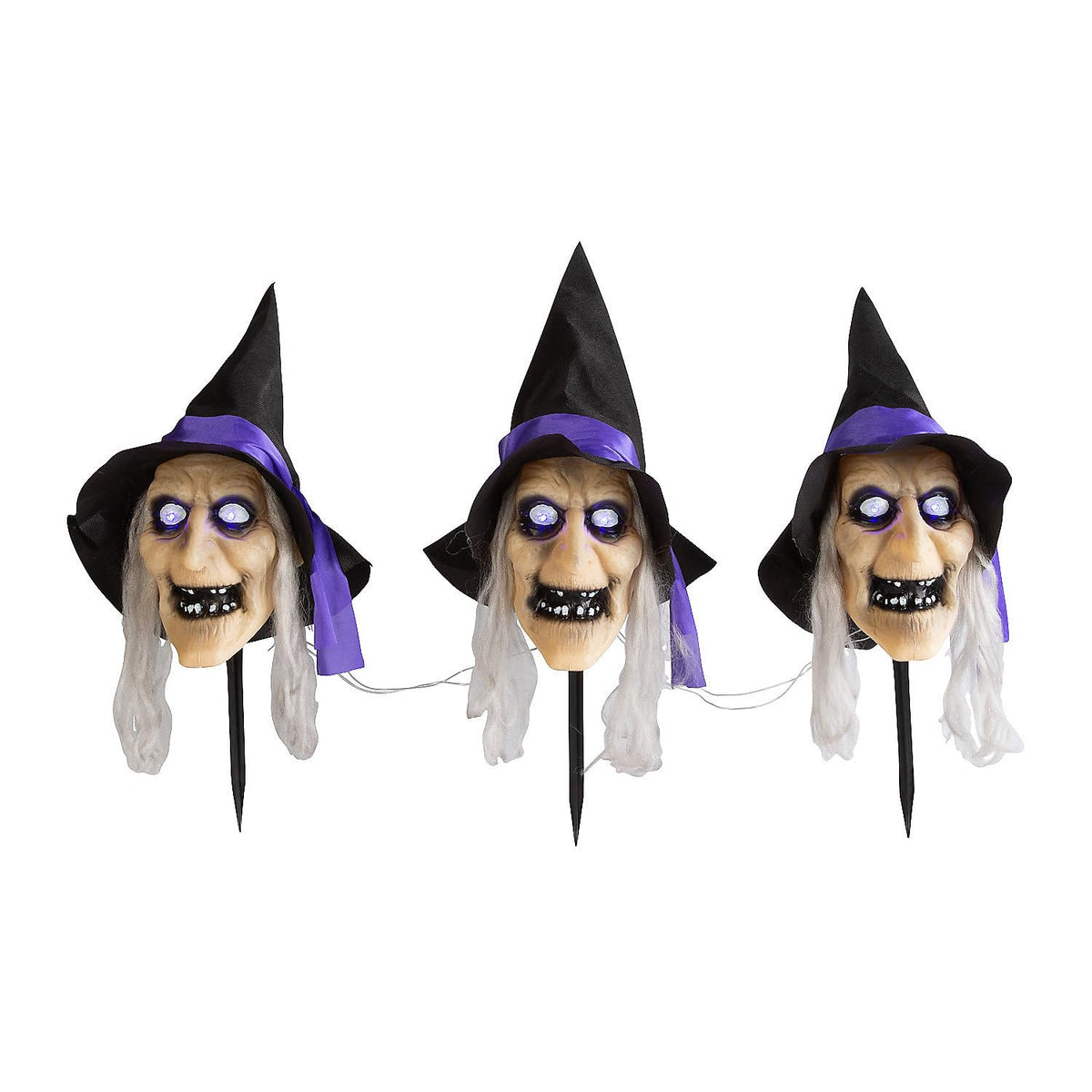 Fun Express 3 Pieces 2 ft. Light-Up Witch Head Yard Stake Halloween Decorations