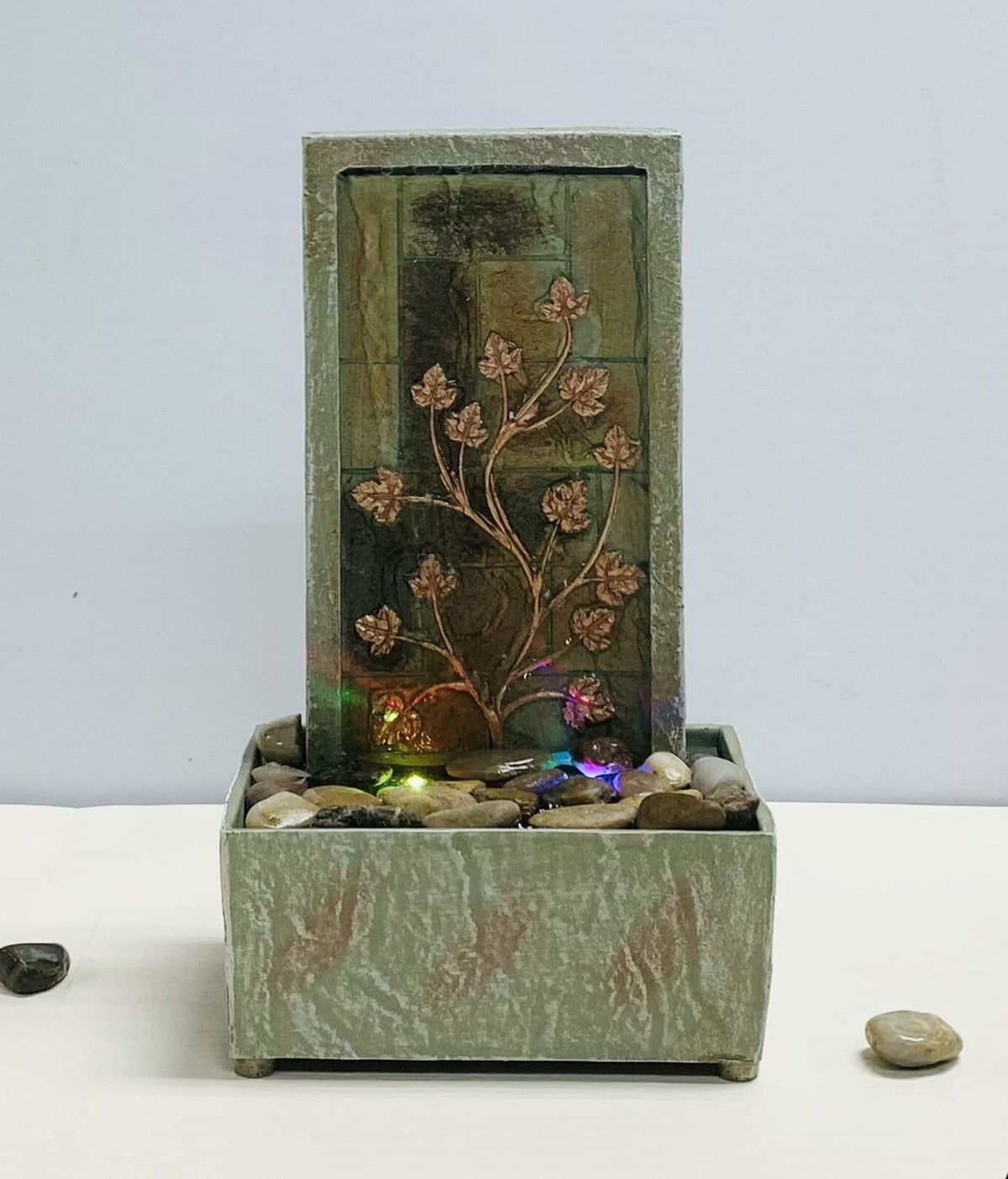 Nature's Mark 9.5" H Tree Branch Leaves Tabletop Water Fountain with Natural River Rocks and LED Lights (Power Cord Attached)