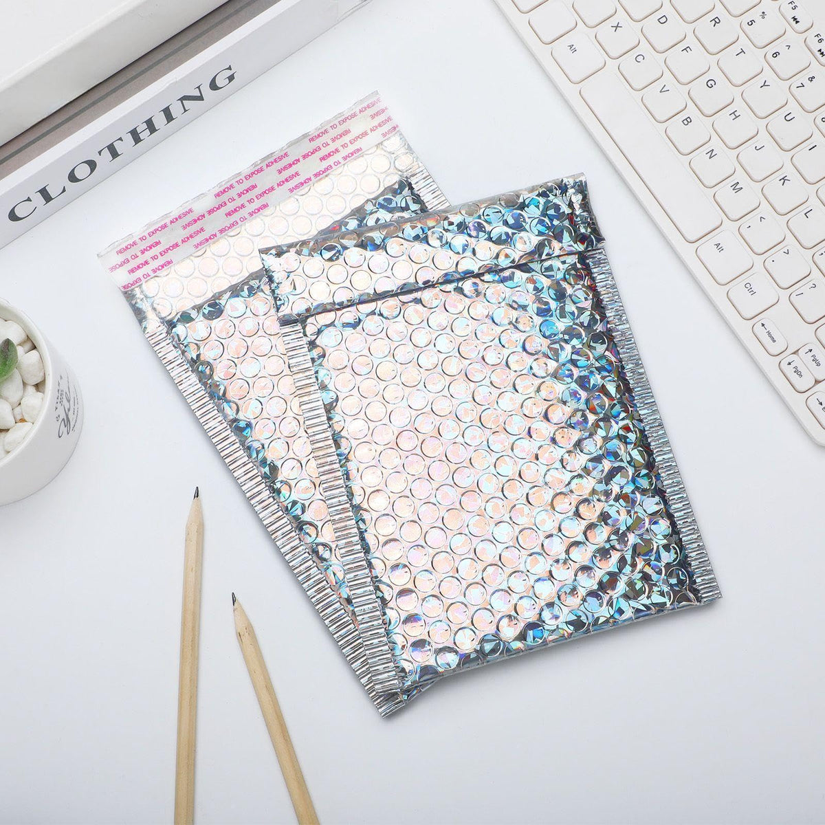 Fulmoon 30 Pieces Holographic Bubble Mailers 4x8 Inch Padded Mailer Holographic Bubble Mailers Padded Envelopes Self Adhesive Cushion Envelopes for Mailing Shipping and Packing(Silver)